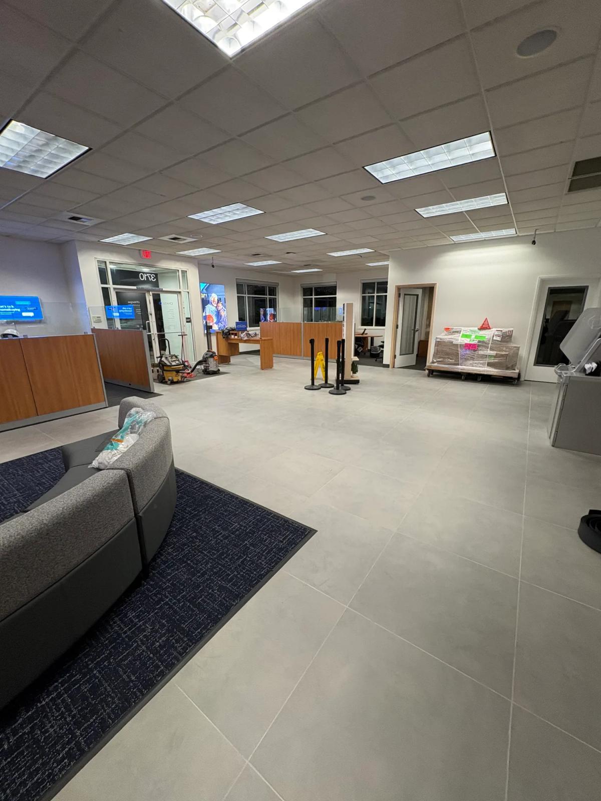 Banking hall finished in tile with carpet at the seating area