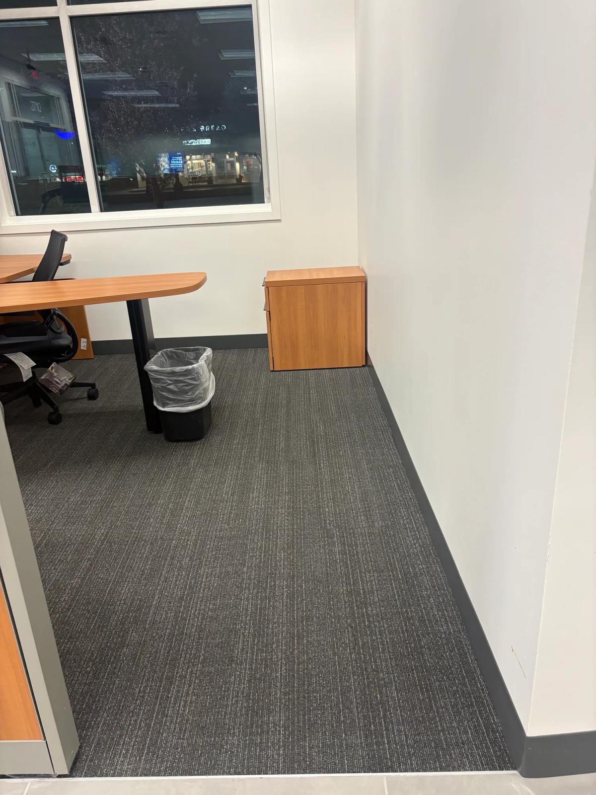 Carpet tile and new rubber base in a private office