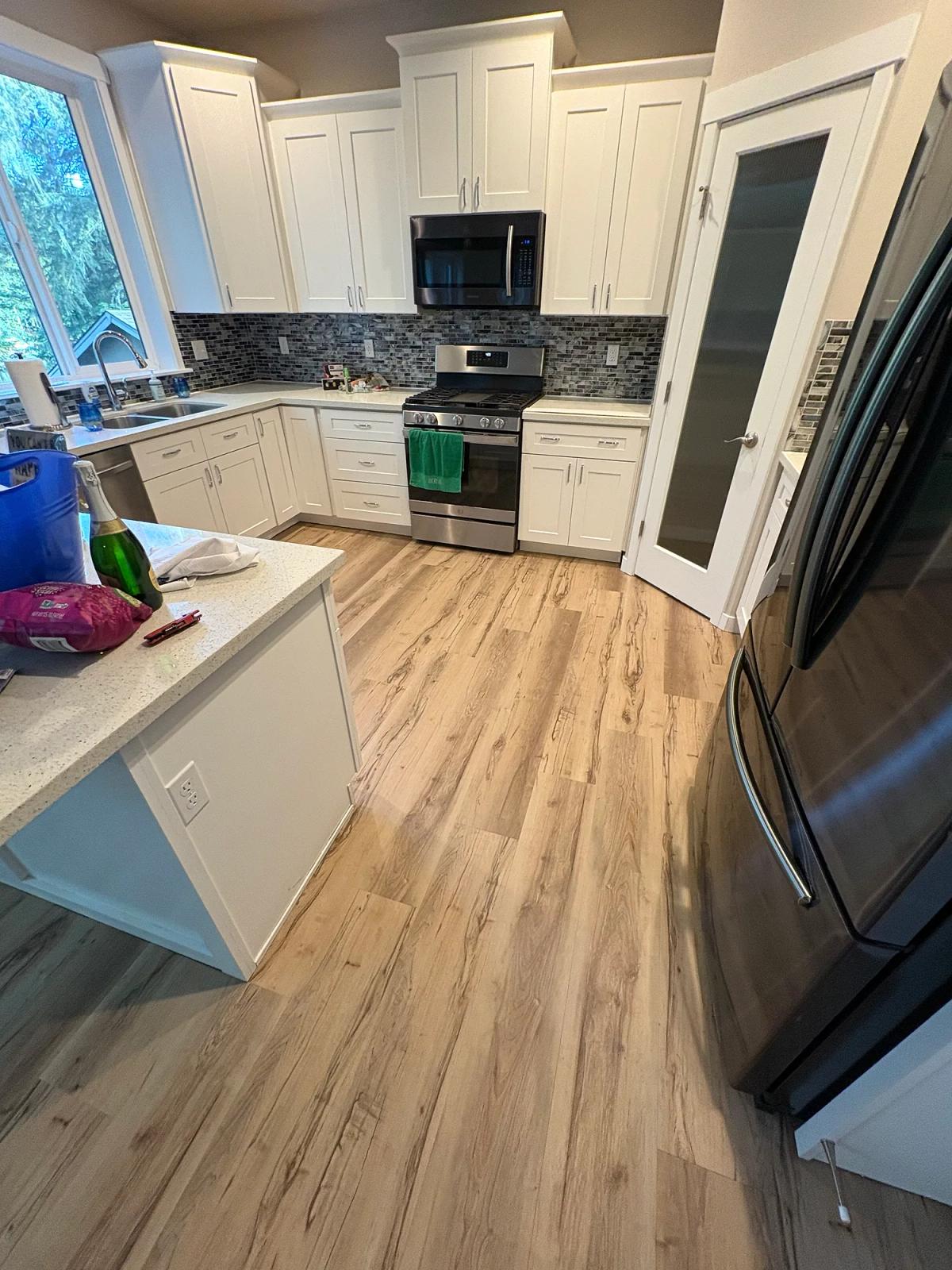 New LVP flooring through the kitchen